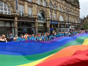 Leeds Pride 2025 Main flag choir Leeds Markets